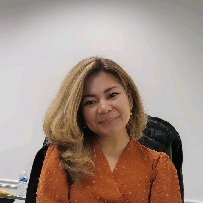 A smiling member of Annotera’s leadership team, representing expertise and professionalism in data annotation.